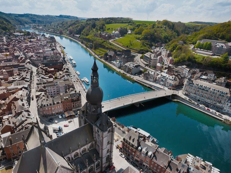 Dinant on the Meuse, the bulbous spire of its collegiate church above the river and bridge