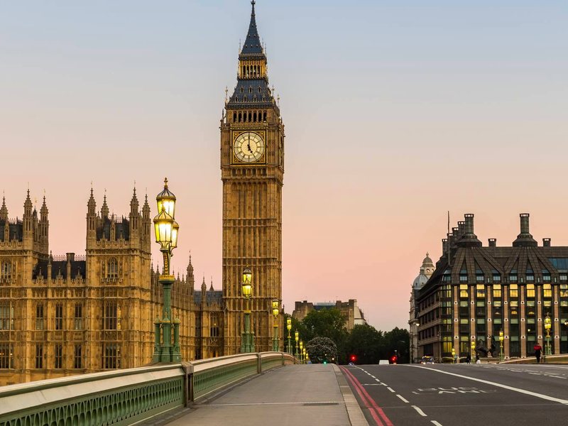 Big Ben and the Houses of Parliament seen from Westminster Bridge at dawn